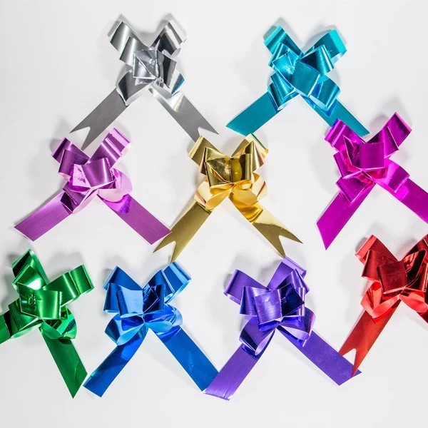 MOÑO MAGICO GDE. METAL. COLORS BOLSA C12 SURT.